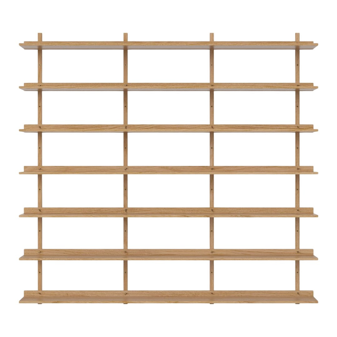 Light oak wood shelving unit with a minimalist design featuring multiple horizontal and vertical shelves.