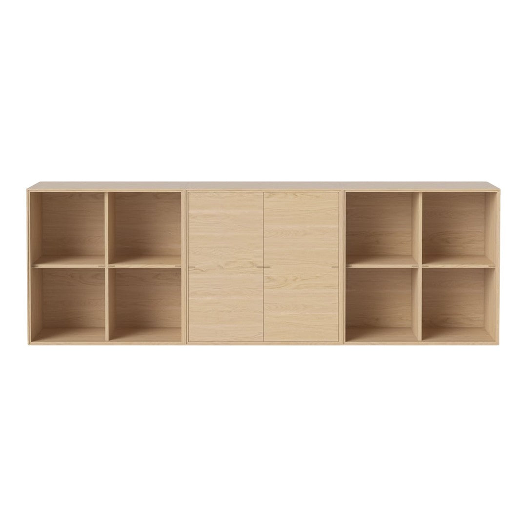 Light oak wood storage unit with smooth finishes and a minimalist design featuring six open cubbies.