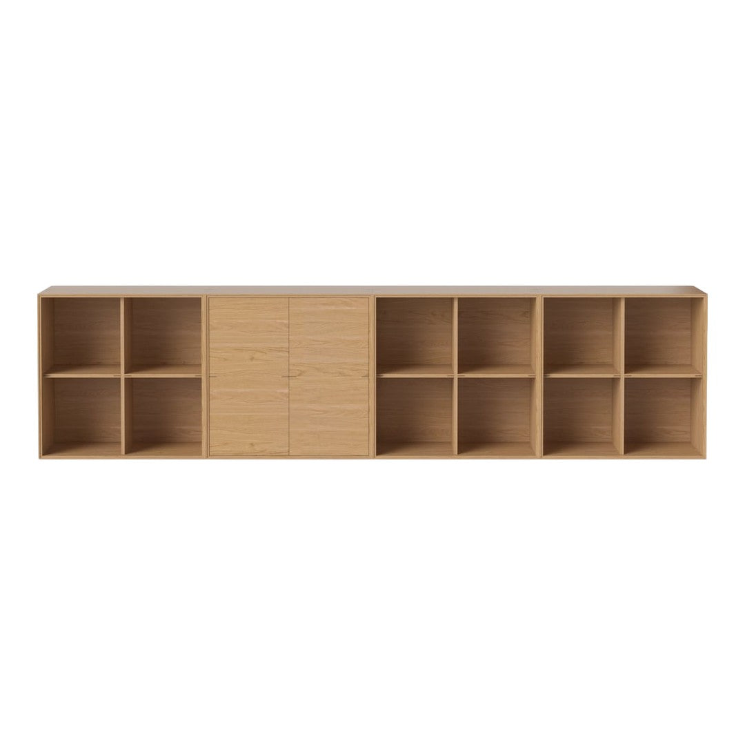 Minimalist light wood TV stand with nine open cubbies and two central drawers, showcasing a natural grain pattern.