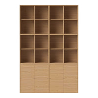 Light oak wood shelving unit with twelve open cubbies and four lower cabinets, showcasing a natural wood grain pattern.