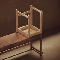 Light natural wood with a minimalist design, featuring smooth grains and warm tones against a soft, neutral background.