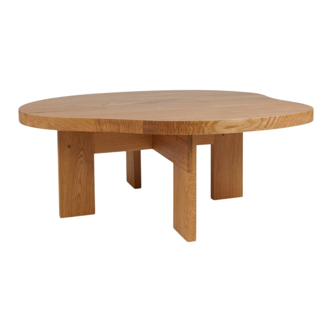 Round wooden coffee table with a smooth, natural oak finish and minimalist design. Perfect for modern decor.