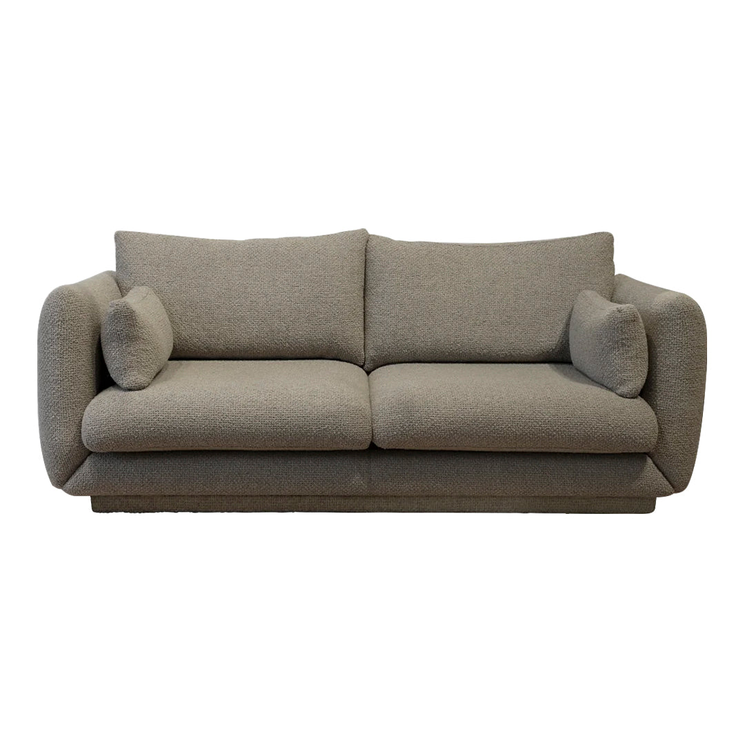 Textured grey upholstered sofa with plush cushions, perfect for modern and cozy living spaces.