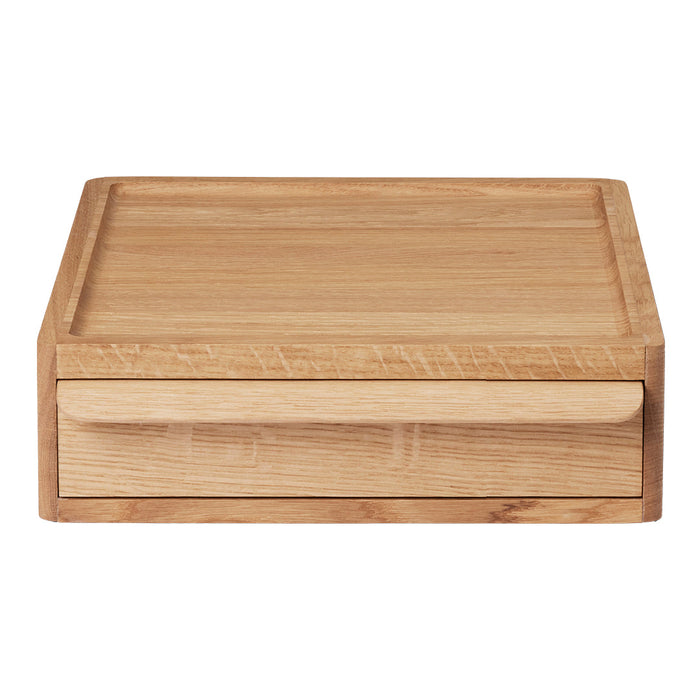 Natural wood drawer organizer with a smooth, light oak finish and a minimalist design. Perfect for tidy storage.