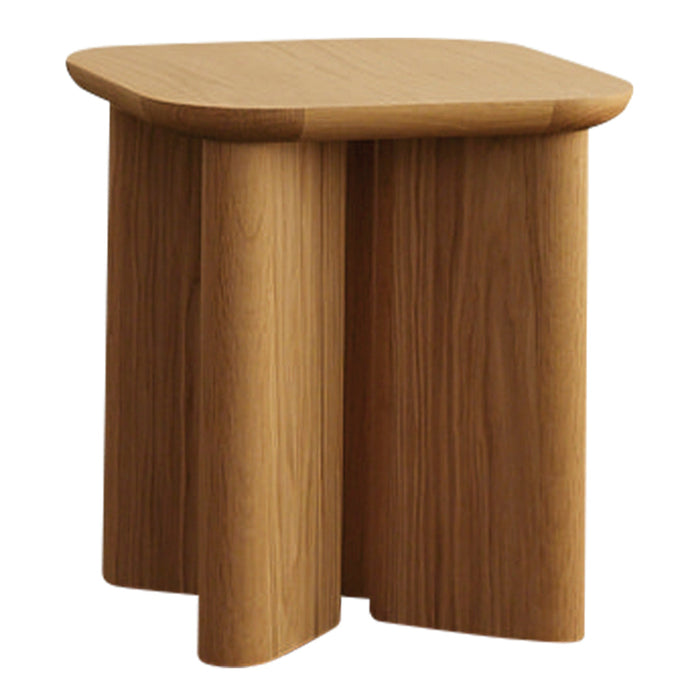 Natural wood grain end table with rounded edges and cylindrical legs in warm, light brown tones. Minimalist design.