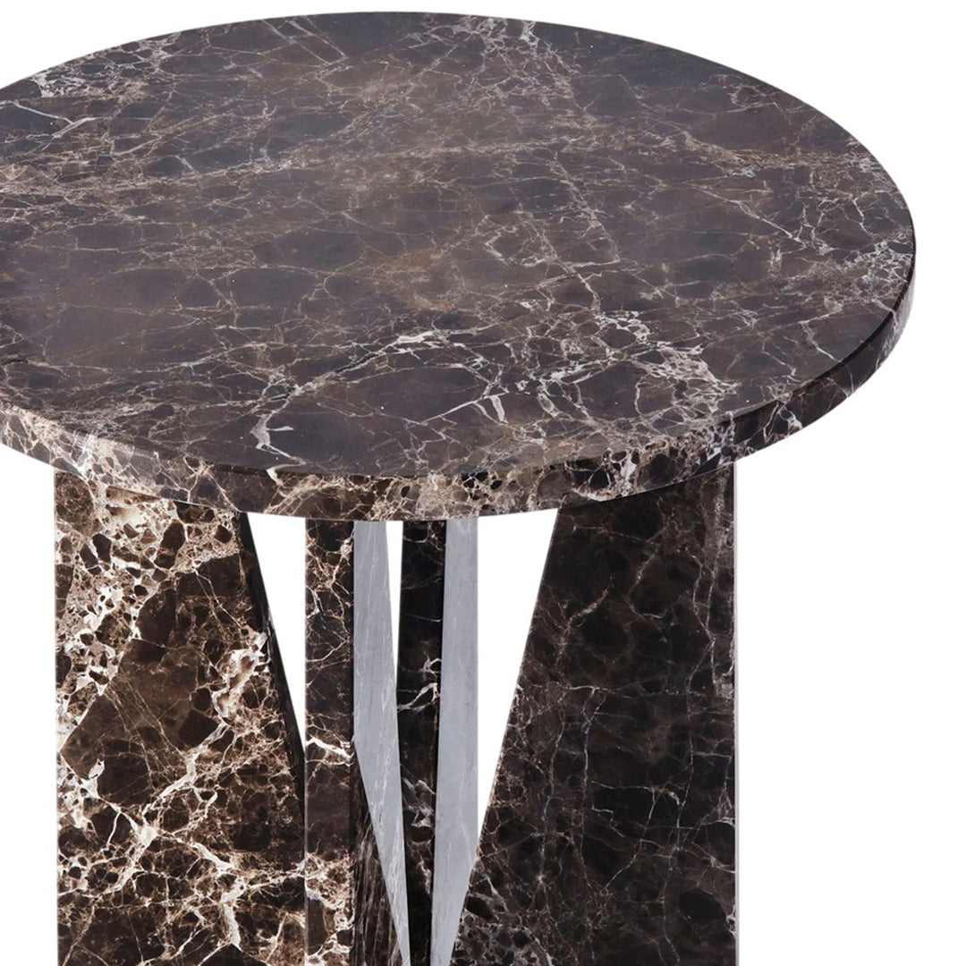 Elegant round table with a dark marble top featuring rich brown and black swirls, complemented by sleek silver accents.