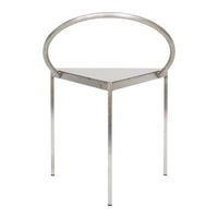 Sleek silver metal chair with a unique triangular design and minimalist circular backrest, creating a modern aesthetic.