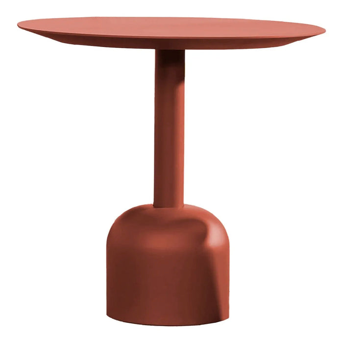 Round table in deep terracotta with a smooth matte finish and minimalist design. Ideal for modern decor.