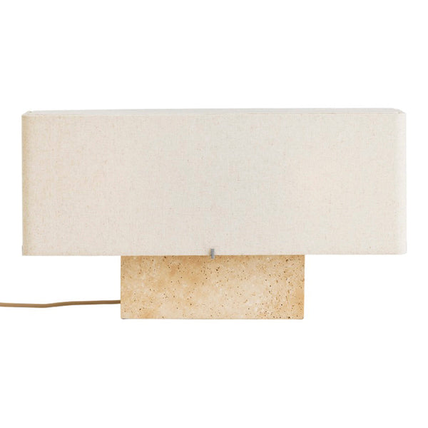 Minimalist beige lamp with a textured stone base and a soft white fabric shade, perfect for modern decor.