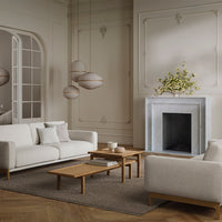 Neutral-toned modern living room featuring white sofas, wooden tables, and soft beige patterns. Elegant and inviting decor.