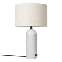 White marble lamp base with a beige textured fabric shade, featuring a minimalist design. Perfect for modern decor.