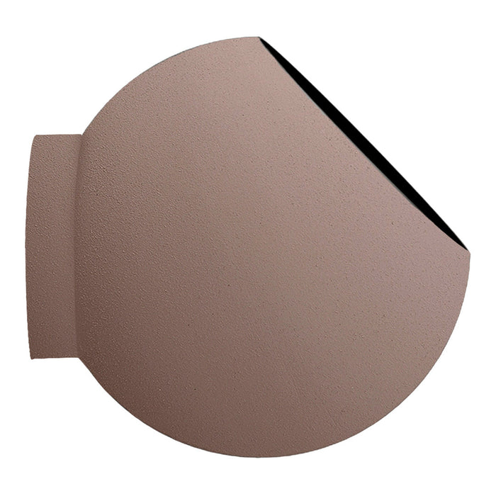Round terracotta wall planter featuring a textured soft pink surface and a contrasting black rim.
