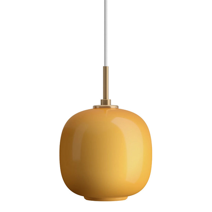 Round yellow pendant light with a glossy finish and brass accents, hanging from a white cord.