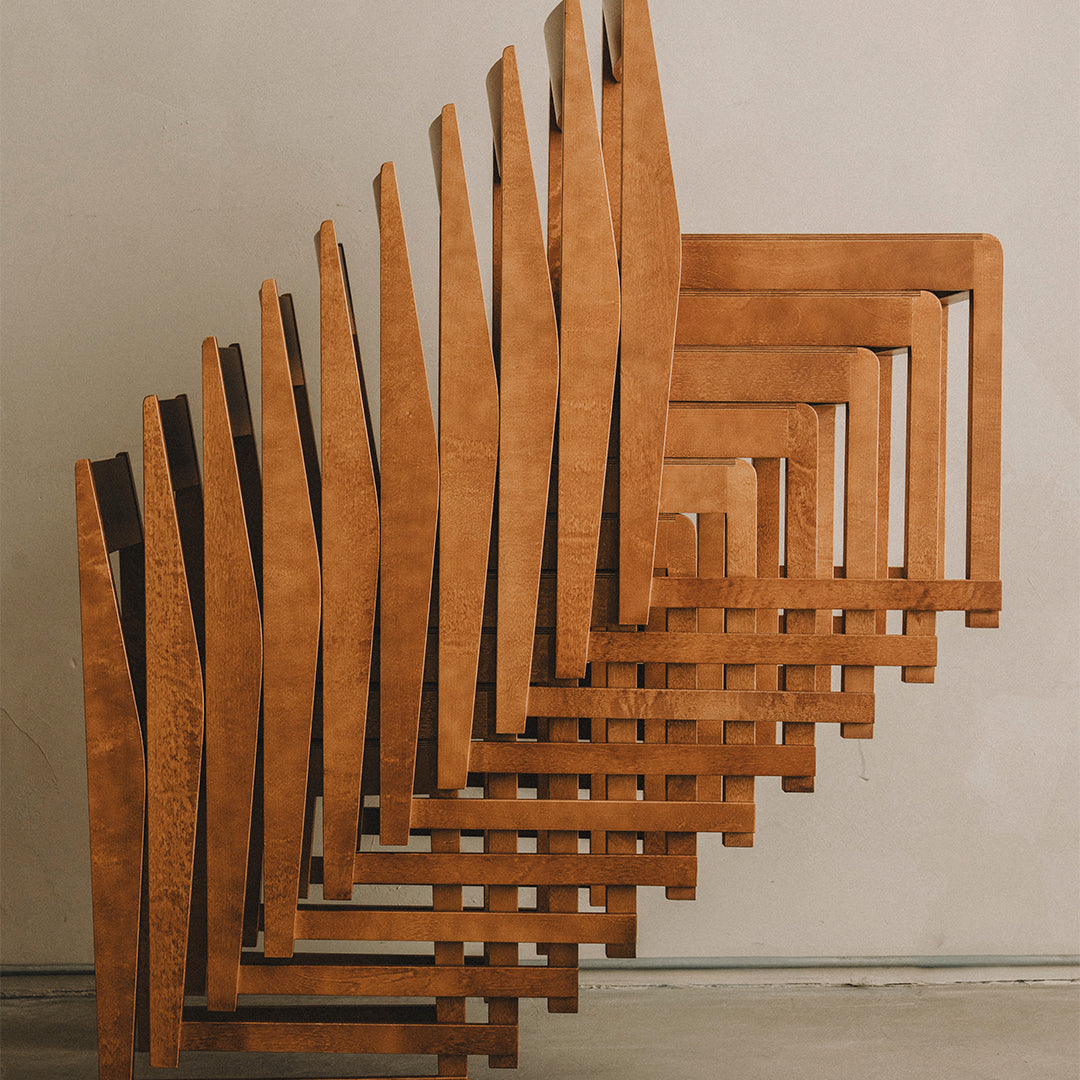 Wooden geometric shelves in a warm, rich brown finish, featuring a modern zigzag pattern.
