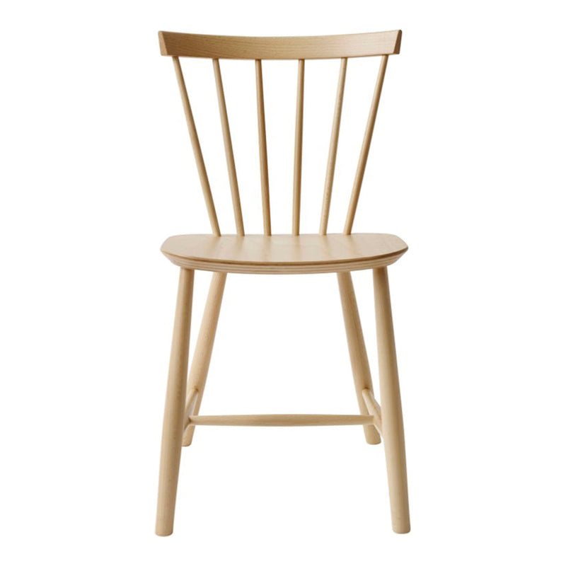 Light natural wood chair with a minimalist design featuring smooth, warm tones and simple spindle back.