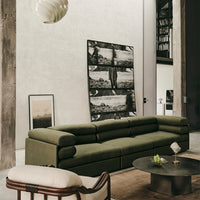 Sleek olive green sectional sofa with a modern pattern, set against a minimalist backdrop for a stylish look.