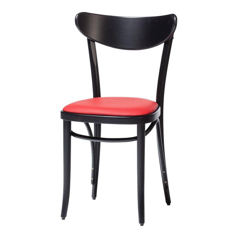 Black wooden chair with a smooth, rounded back and a vibrant red upholstered seat.
