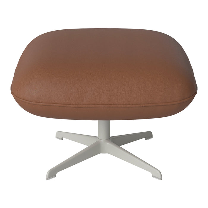Brown leather ottoman with a smooth texture and minimalist white base, perfect for modern decor.