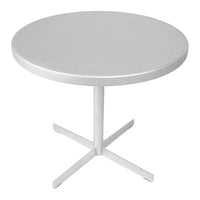 Round silver table with a smooth surface and minimalist cross base. Perfect for modern decor.