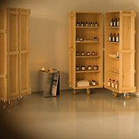 Natural wood finish cabinets on wheels, featuring warm beige tones and minimalistic design, enhancing a calm aesthetic.