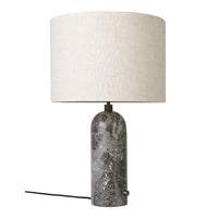 Elegant grey marble lamp base with a soft white linen shade, featuring a smooth cylindrical design and minimalist aesthetic.