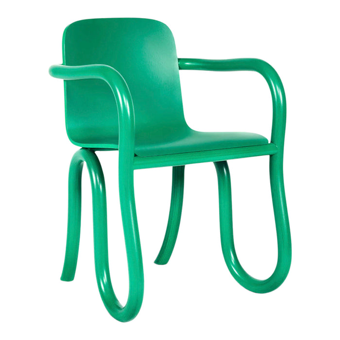 Bright green chair with smooth curves and a minimalist design, perfect for modern decor. Ideal for vibrant spaces.