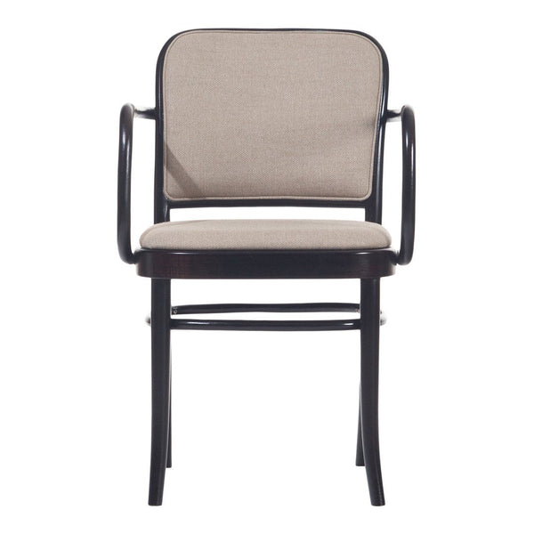 Elegant black chair with a neutral beige fabric seat and backrest, featuring a simple, clean design.