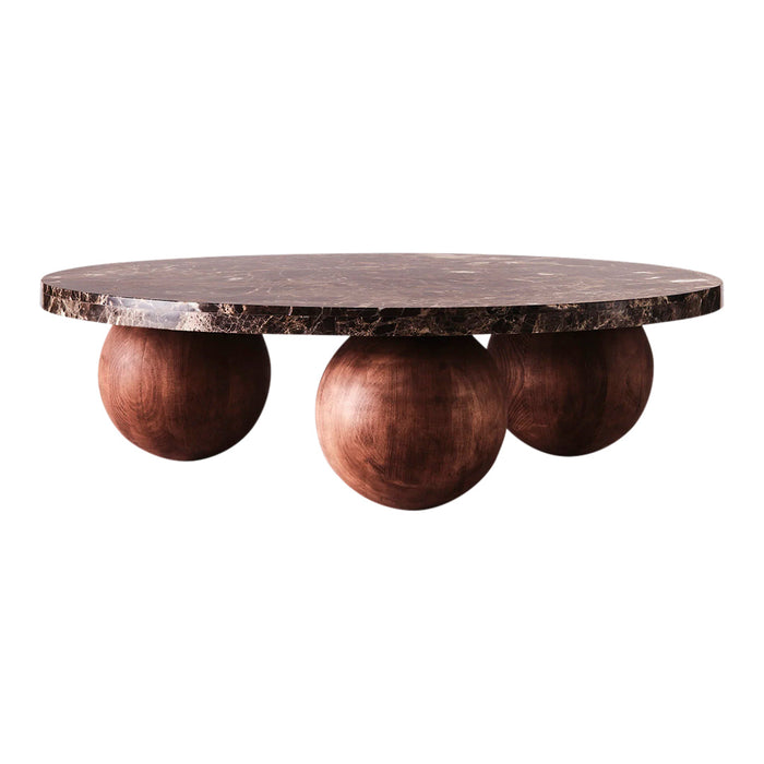 Round coffee table with a dark marble top and warm wooden spheres as legs, featuring rich brown tones.