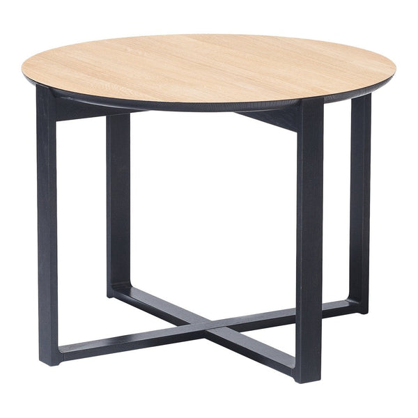 Round wood tabletop in light oak color with black metal cross-leg frame. Modern, minimalistic design.