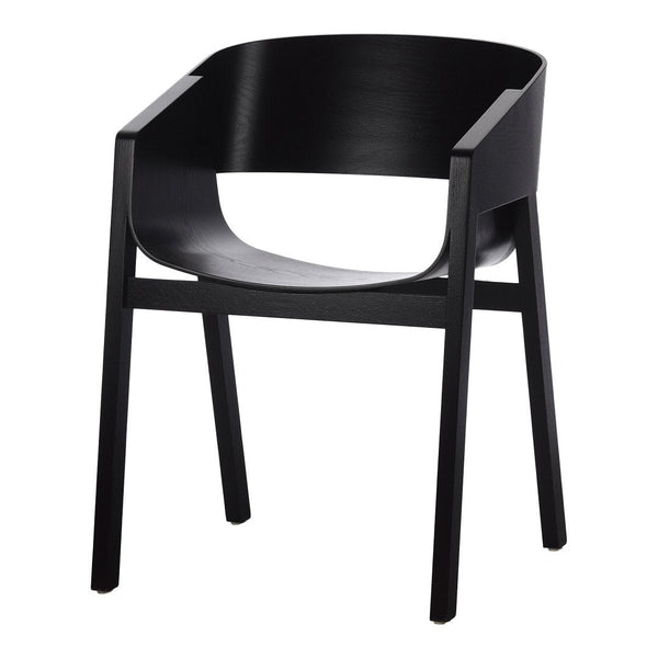 Sleek black chair with a minimalist design and smooth, curved lines, perfect for modern interiors.