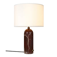 Brown marble lamp base with white cylindrical shade, featuring elegant gold accents. Perfect for modern decor.