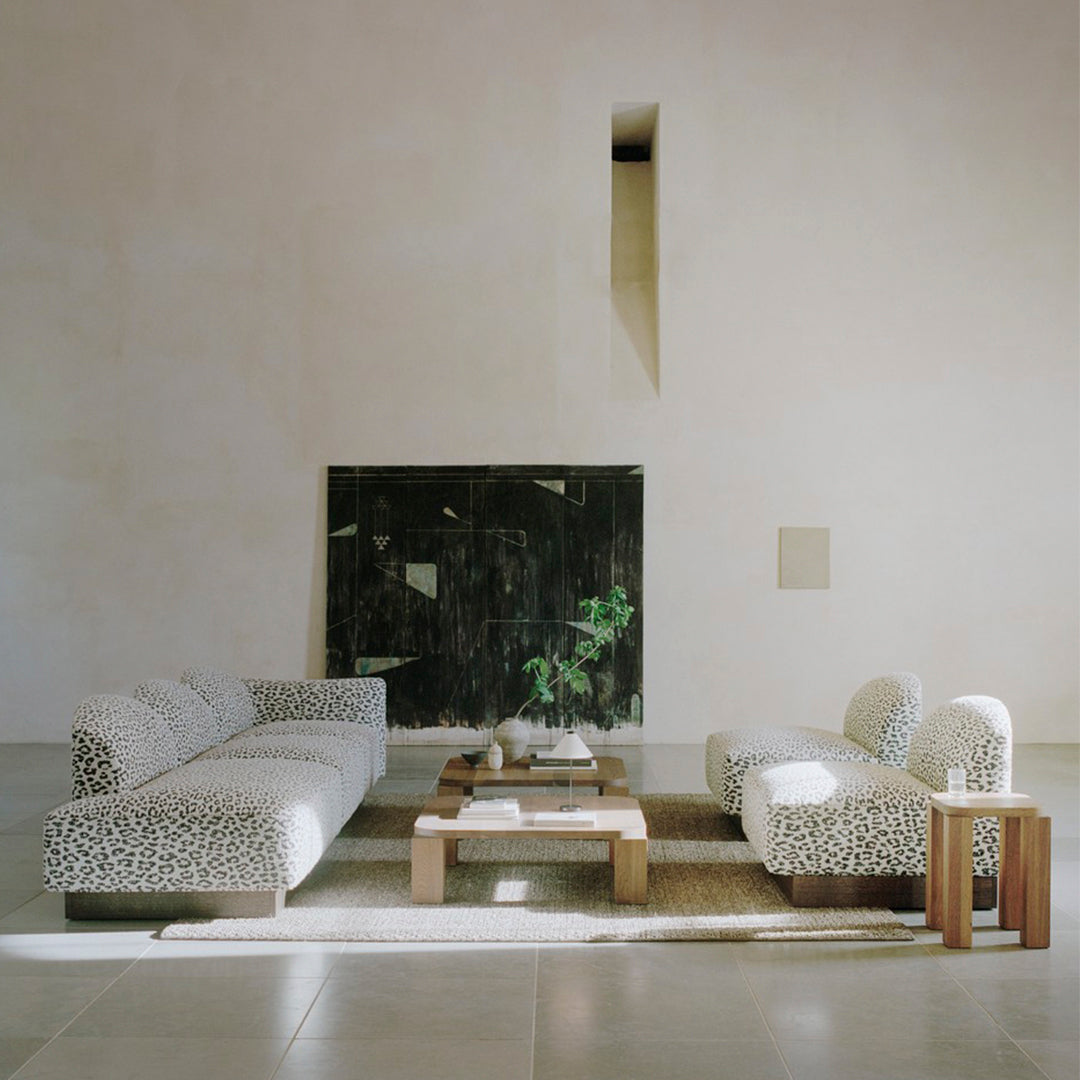 "Modern sofa set featuring a black and white leopard print pattern on soft upholstery."