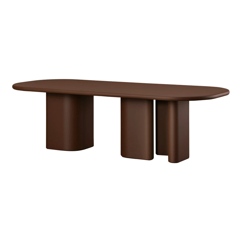 Brown oval table with smooth, matte texture and modern, minimalist design featuring rounded edges and bold legs.