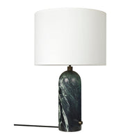 Marble-patterned lamp base in deep green hues, topped with a sleek white shade for a modern look.