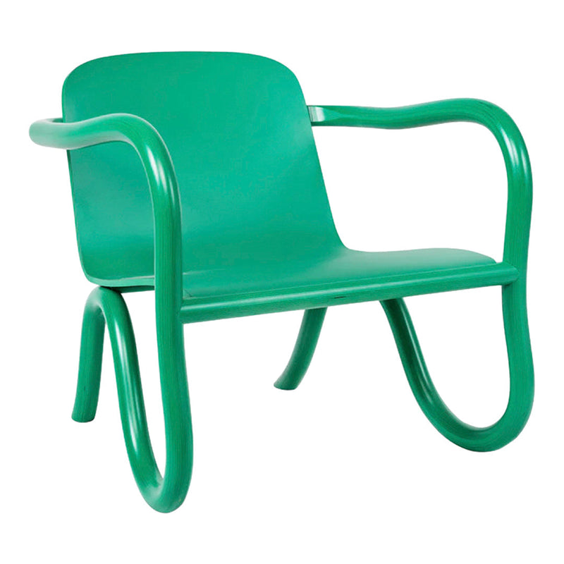 Bright green chair with smooth curves and minimalistic design, perfect for modern decor.