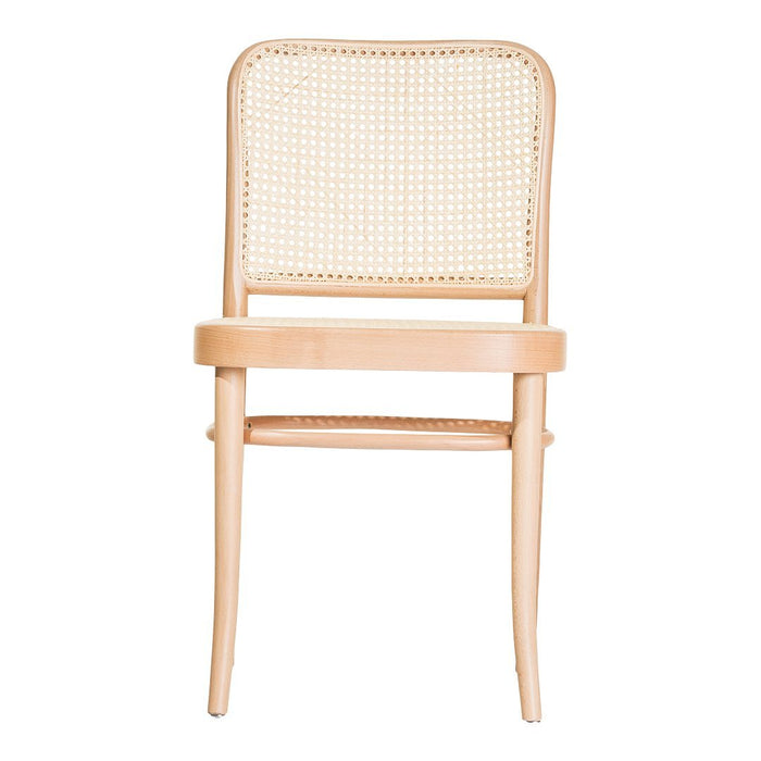 Natural wood chair with a light rattan backrest, featuring a minimalist design and neutral color palette.