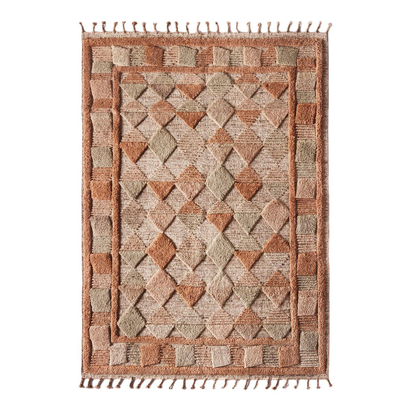 Textured area rug featuring earthy tones of beige, rust, and green with a geometric diamond pattern and fringed edges.