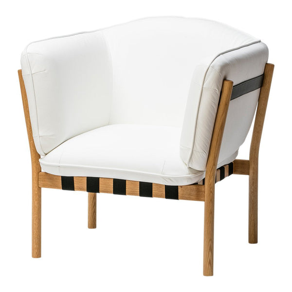 White upholstered chair with black and natural wood stripes, featuring a modern, stylish design.