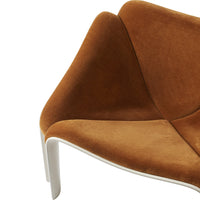 Brown suede chair with a modern design and smooth white legs, featuring clean lines and a minimalist aesthetic.
