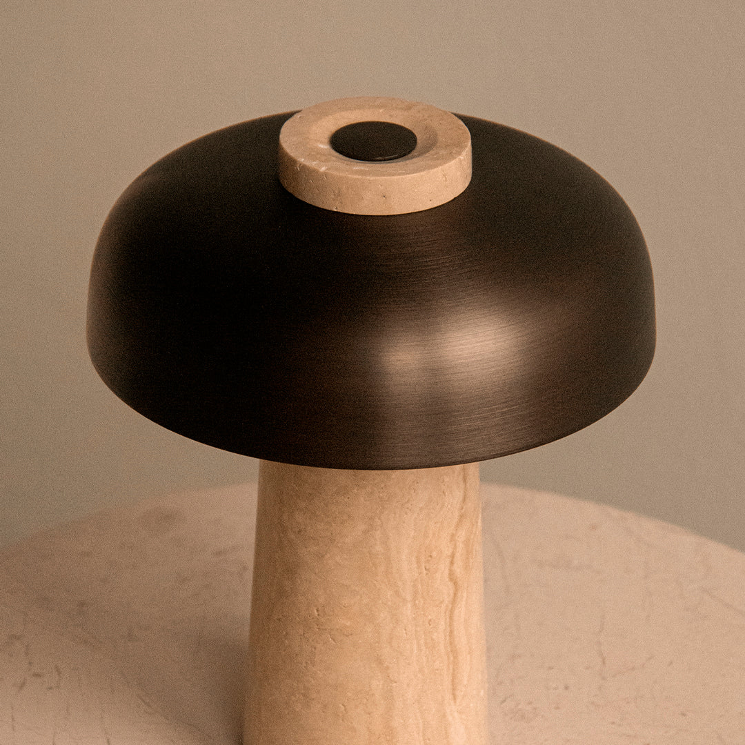 Black and cream color contrast lamp with smooth, rounded shapes and a minimalist design. Perfect for modern decor.