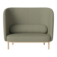 Stylish green upholstered armchair with a textured pattern and wooden legs for a modern look.