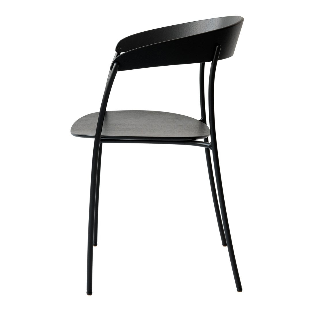 Sleek black chair with a minimalist design, featuring smooth curves and a solid gray seat. Perfect for modern decor.