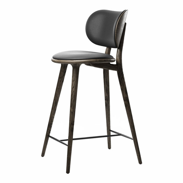 Black upholstered bar stool with a sleek, curved back and dark wood legs for a modern look. Ideal for contemporary decor.