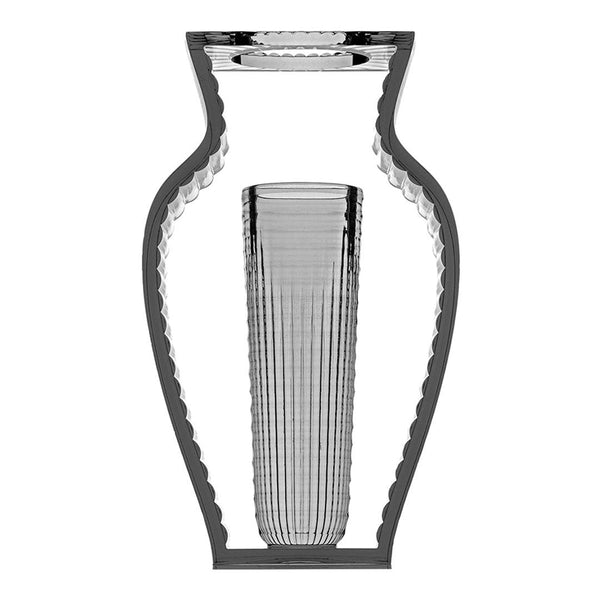 Clear crystal vase with a sleek, ribbed texture and elegant black outline, showcasing modern design and intricate patterns.