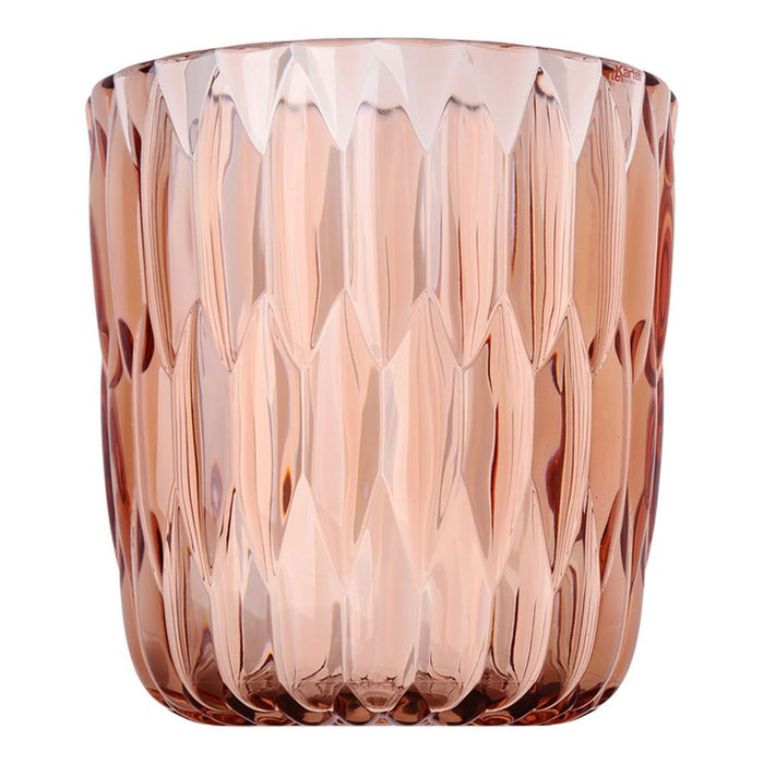 Rose-tinted glass cup featuring a faceted design with a smooth, polished finish. Perfect for elegant decor.
