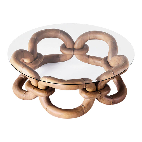 Round glass coffee table with a natural wood chain link pattern, featuring warm brown tones and a sleek, clear surface.
