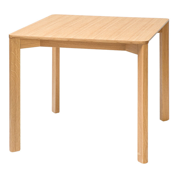 Light natural wood square dining table with a smooth finish and simple, clean lines. Perfect for modern spaces.