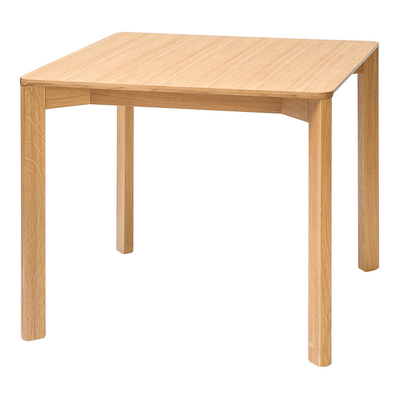 Light natural wood square dining table with a smooth finish and simple, clean lines. Perfect for modern spaces.
