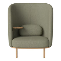 Modern high-back chair in muted olive green fabric with minimalist wooden accents and smooth, curved patterns.