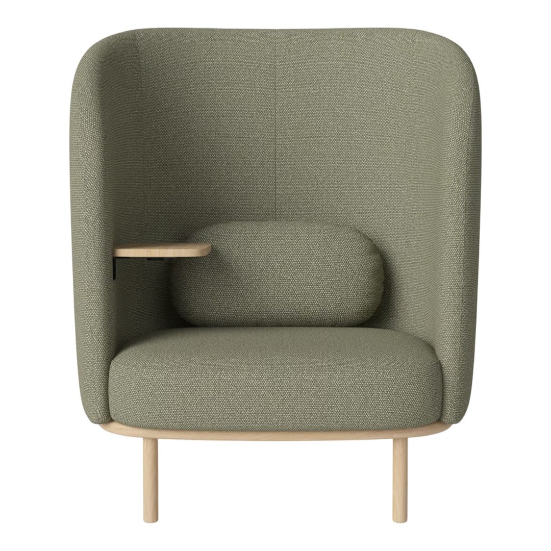 Green upholstered armchair with a textured pattern and minimalist wooden armrest, creating a modern, inviting look.
